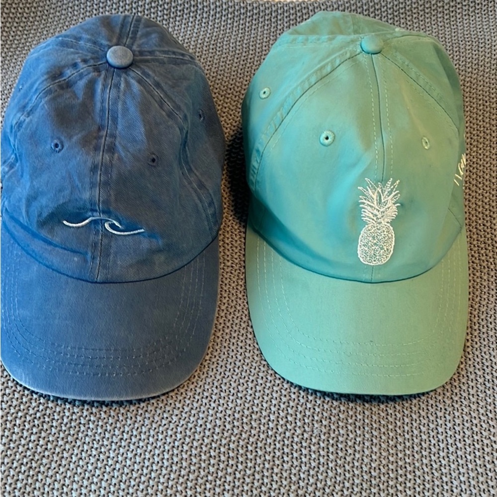 Blue and Green Baseball Caps